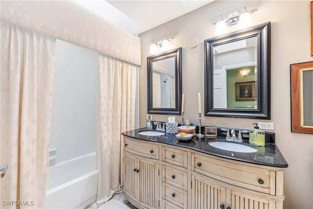 bathroom with shower / bath combination with curtain and vanity