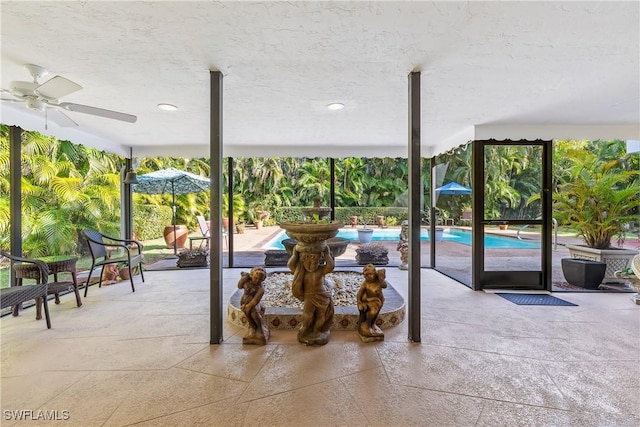 view of patio with ceiling fan