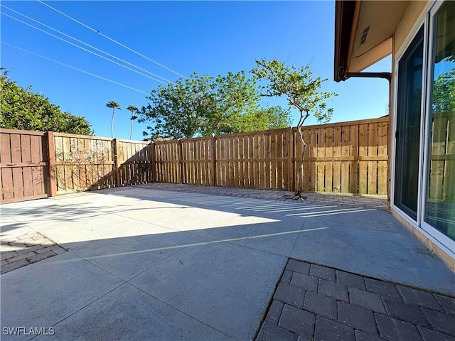 6342 Royal Woods Dr, Fort Myers, FL 33908 - view of patio / terrace featuring a fenced backyard