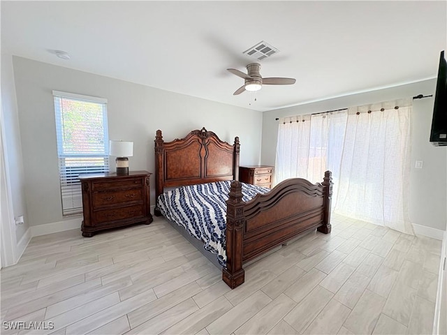 bedroom featuring ceiling fan and light wood-type flooring