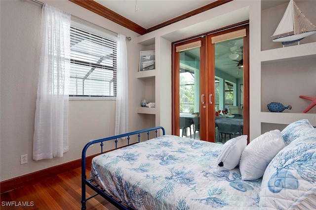 bedroom with dark hardwood / wood-style flooring and ornamental molding