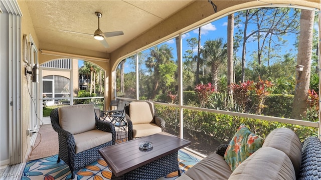 sunroom / solarium with ceiling fan