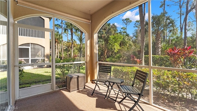 sunroom / solarium with a healthy amount of sunlight