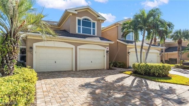 view of front of property featuring a garage