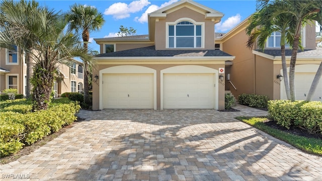 view of front of property featuring a garage