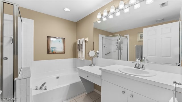 bathroom with vanity, independent shower and bath, and tile patterned floors