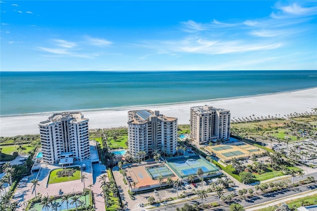 aerial view with a view of the beach and a water view