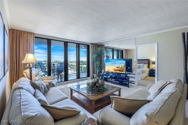 tiled living room featuring a textured ceiling, floor to ceiling windows, and ornamental molding