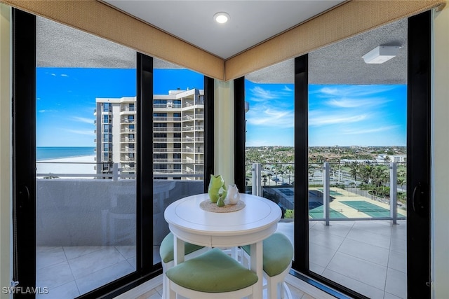 balcony featuring a water view