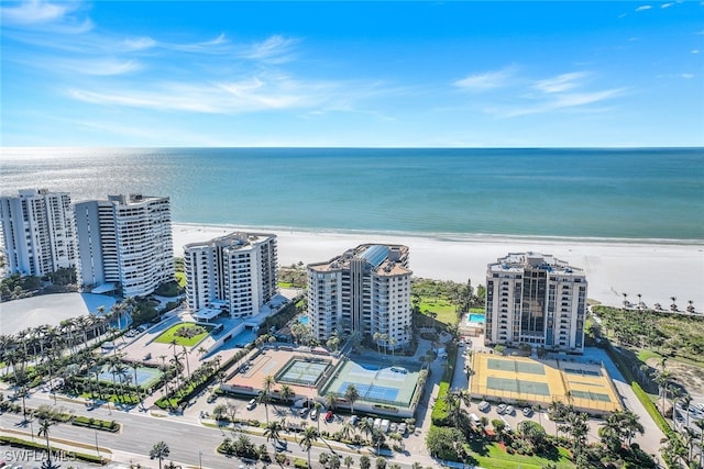 aerial view with a view of the beach and a water view