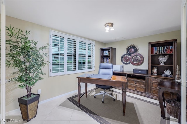 home office with light tile patterned flooring