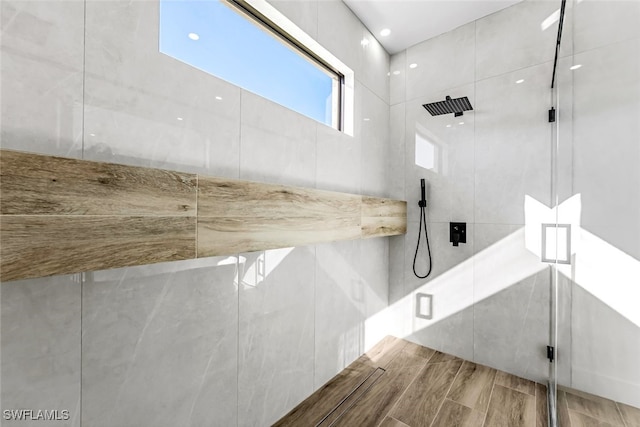 bathroom featuring a shower stall