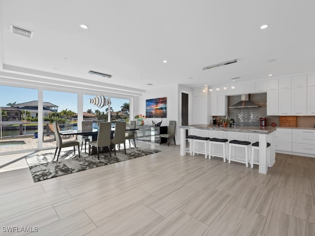 dining space with a water view