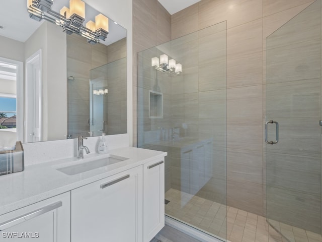 bathroom featuring vanity and walk in shower