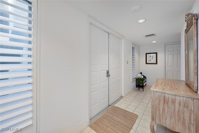 interior space featuring light tile patterned floors