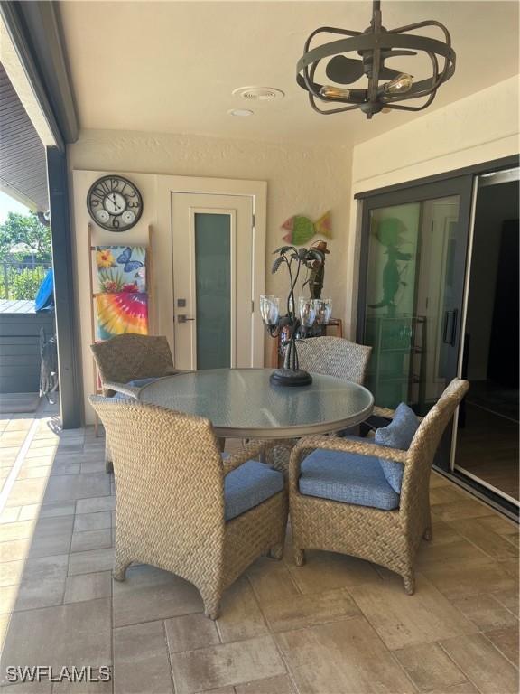 dining room with a chandelier