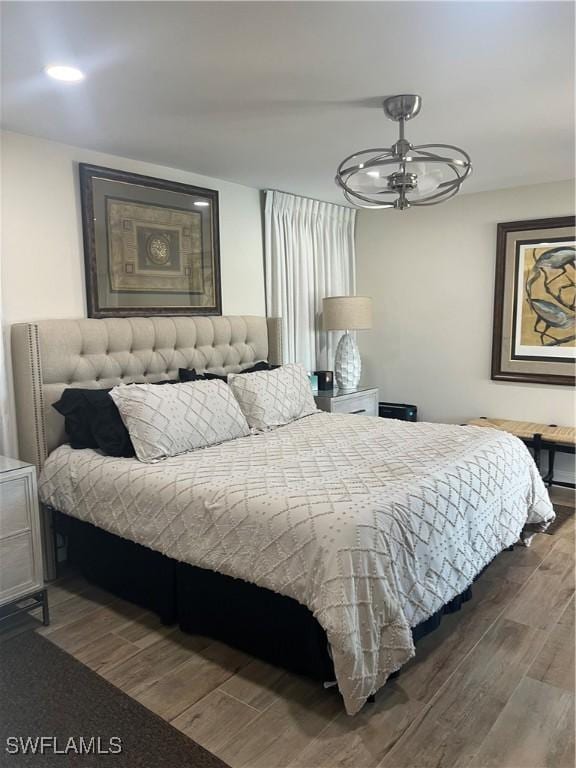 bedroom featuring hardwood / wood-style flooring