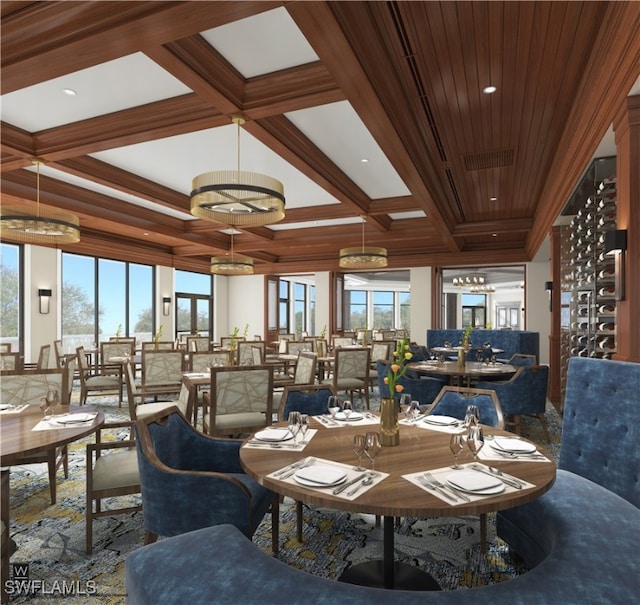 dining area featuring plenty of natural light, beam ceiling, and coffered ceiling