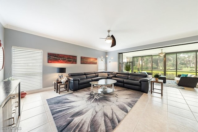 living room featuring ceiling fan, light tile patterned floors, and ornamental molding