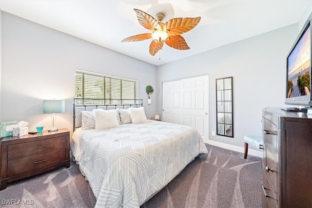 carpeted bedroom with ceiling fan and a closet