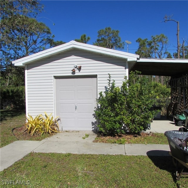 garage with a carport