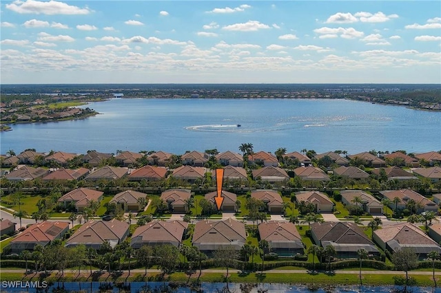 aerial view with a water view and a residential view