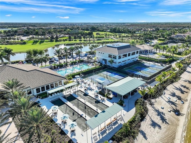 birds eye view of property with a water view