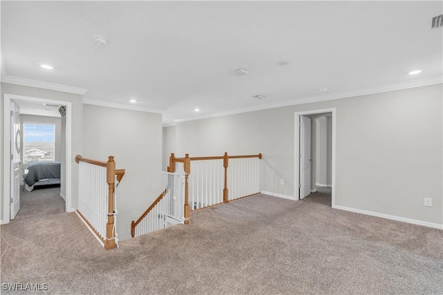 carpeted empty room with ornamental molding