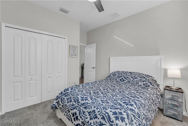 carpeted bedroom featuring ceiling fan and a closet