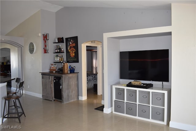 living room featuring vaulted ceiling