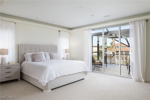 bedroom featuring access to outside and light carpet