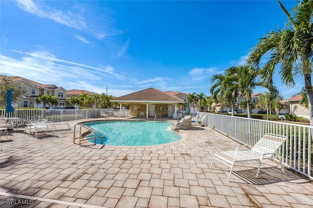 view of pool featuring a patio