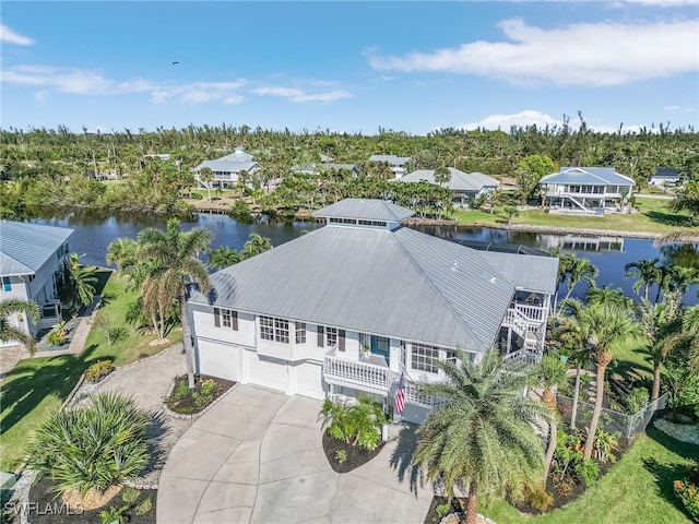 drone / aerial view featuring a water view