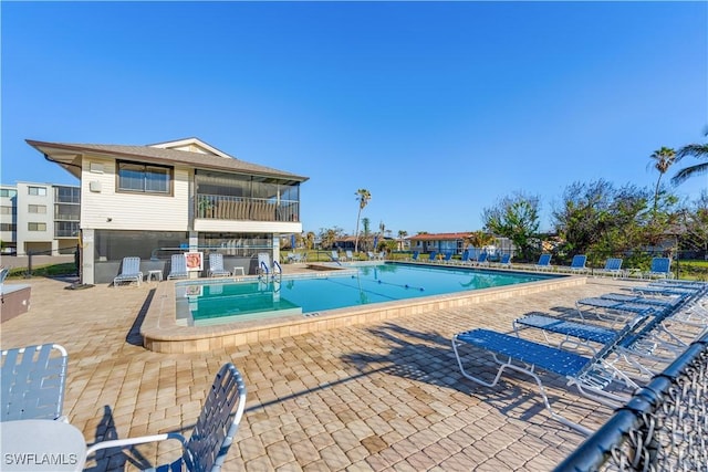 view of pool featuring a patio area