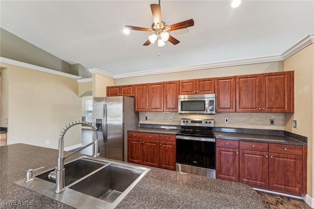 kitchen with ornamental molding, stainless steel appliances, sink, dark hardwood / wood-style floors, and lofted ceiling