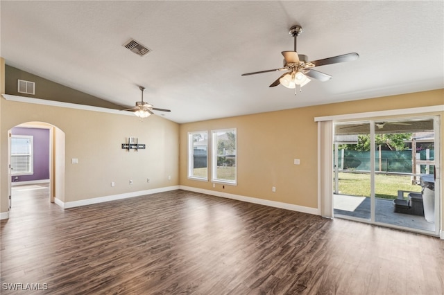 unfurnished room with lofted ceiling, ceiling fan, and dark hardwood / wood-style floors