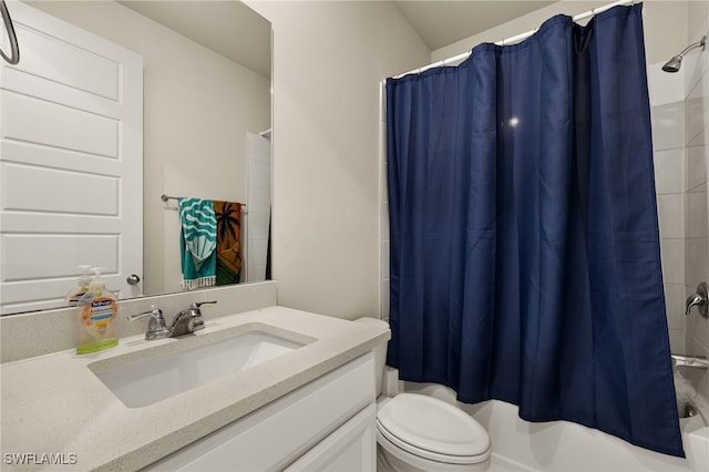 full bathroom featuring vanity, toilet, and shower / tub combo with curtain