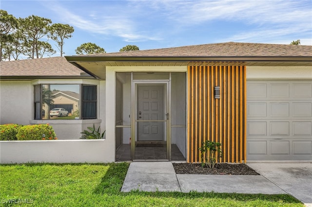 entrance to property with a garage