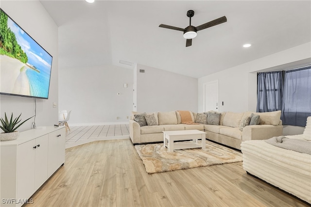 living room with ceiling fan and light wood-type flooring