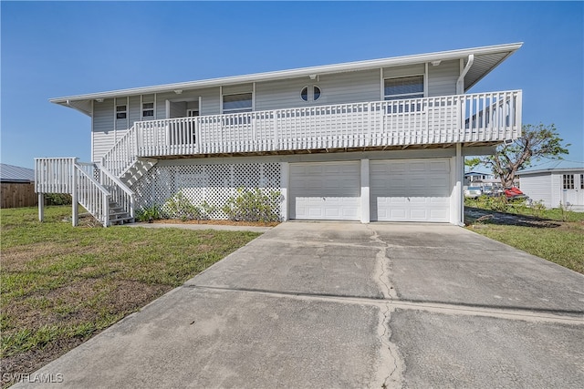 front facade featuring a garage and a front yard