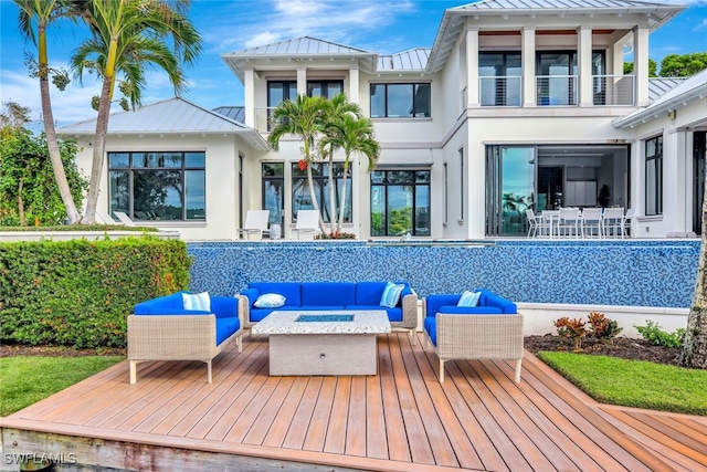 rear view of house featuring an outdoor living space