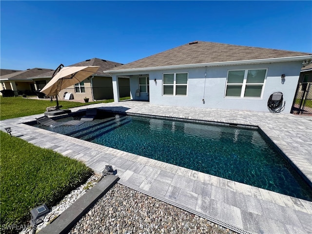 view of pool featuring a patio area