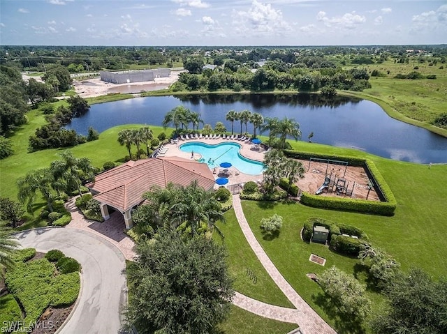 birds eye view of property with a water view