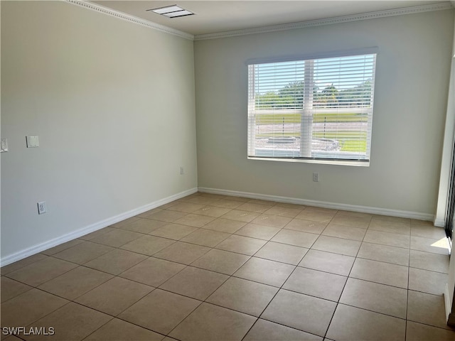 tiled empty room with ornamental molding