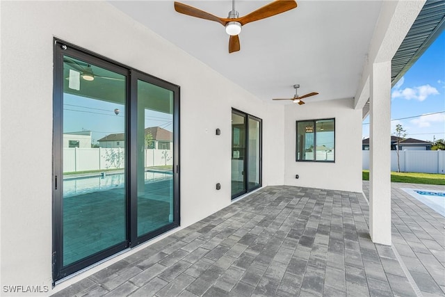 view of patio with ceiling fan