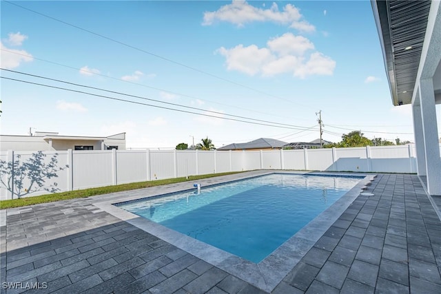 view of pool featuring a patio area