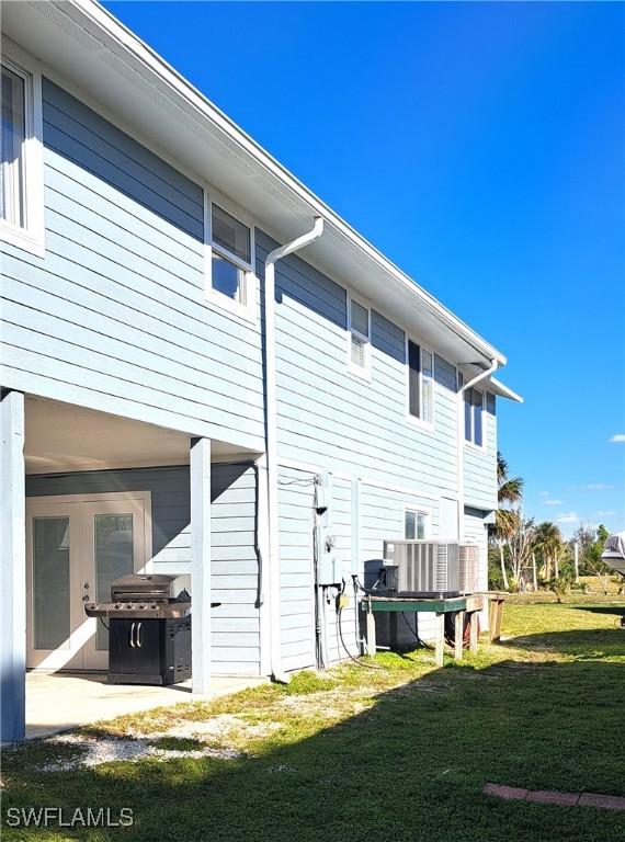 view of home's exterior featuring a yard