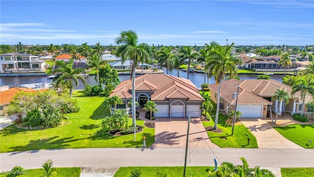 drone / aerial view featuring a water view