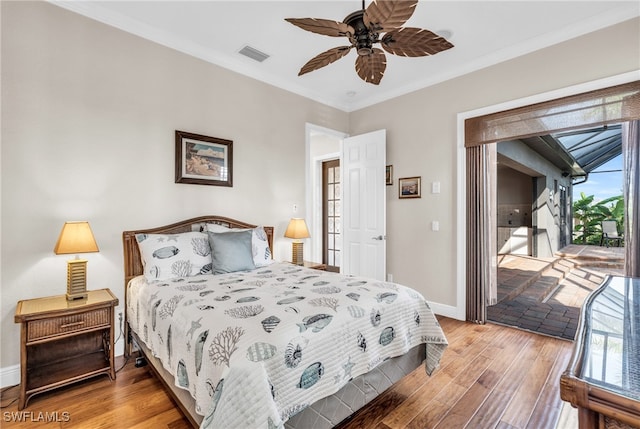 bedroom featuring access to exterior, ceiling fan, wood-type flooring, and ornamental molding