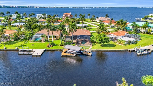 bird's eye view with a water view